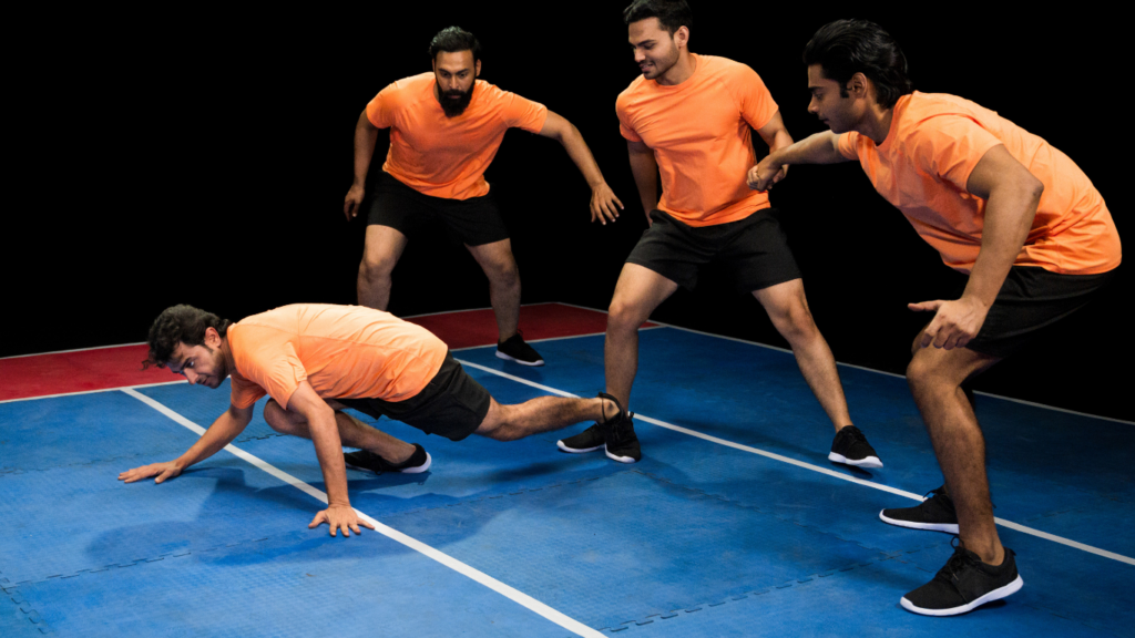 a group of people playing badminton on a court